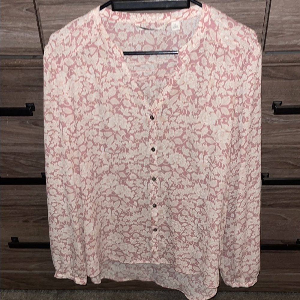 Pink long sleeve button down blouse with v-neck and notched collar